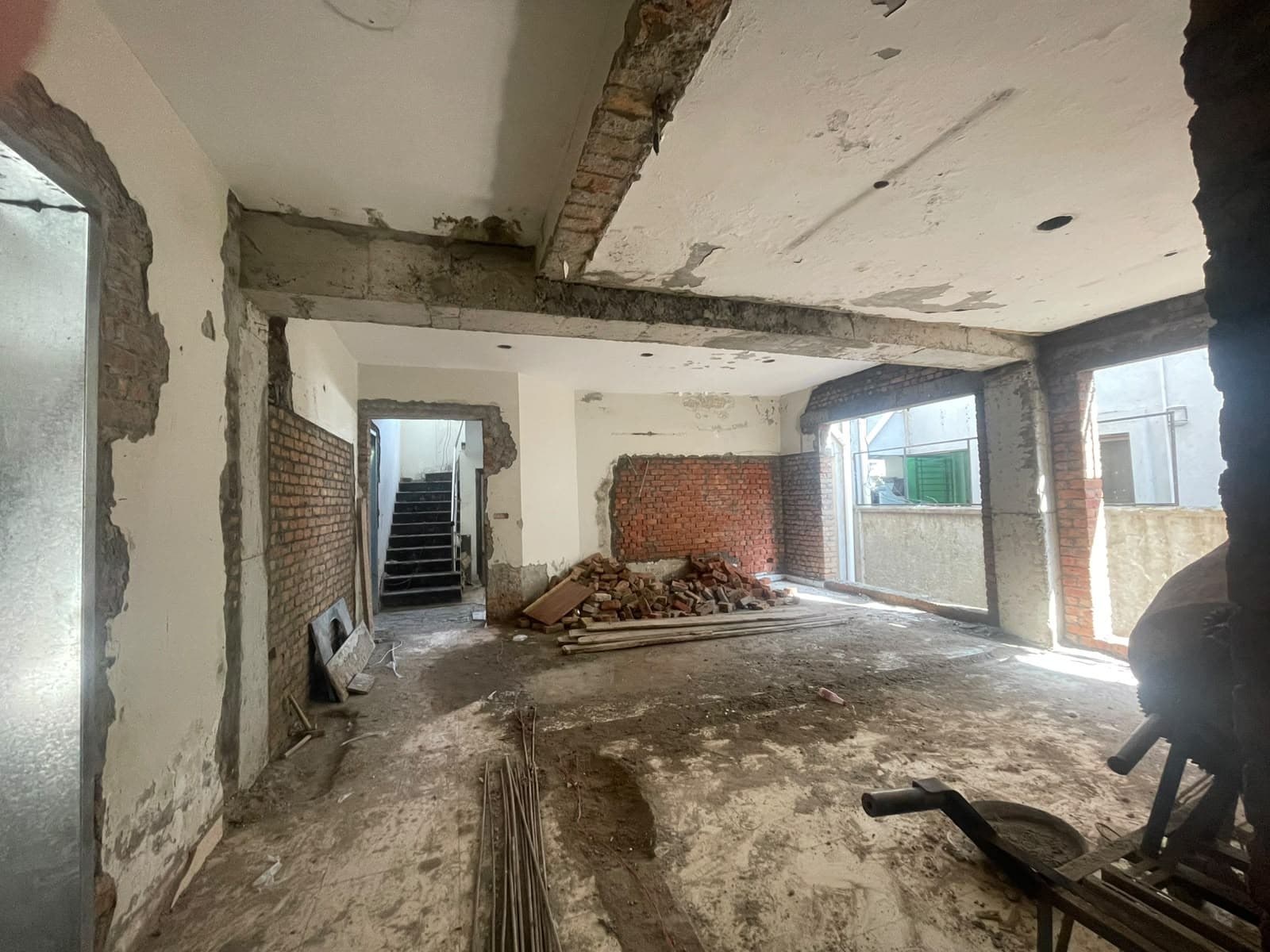 The upper floor of House #162 stripped back to the structure, opened into one space