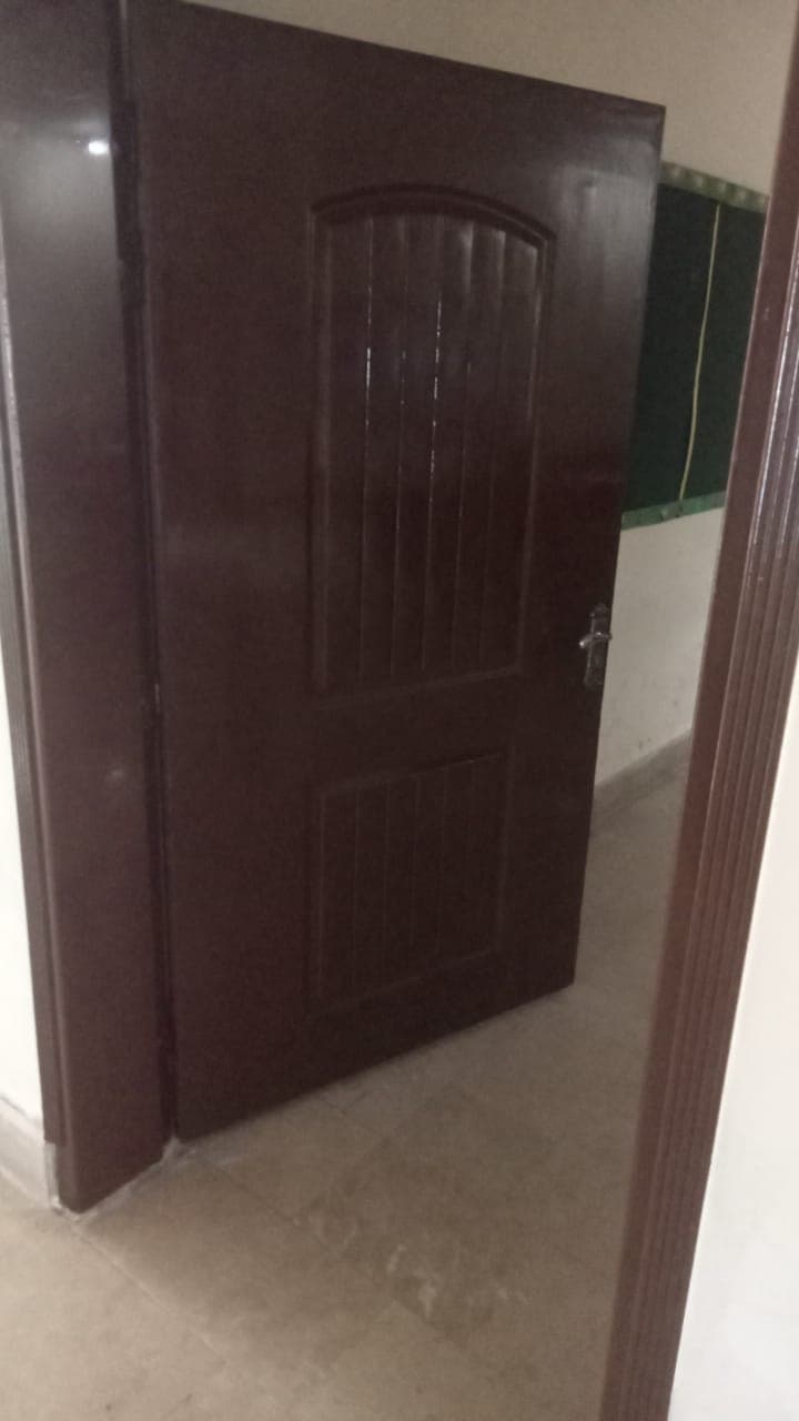 The same door finished in a deep, glossy brown polish